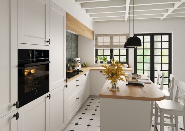 Harmonie parfaite entre le blanc pur et le bois naturel dans une cuisine lumineuse.