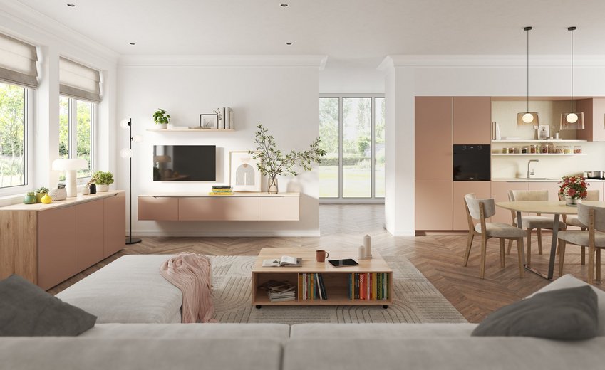 Salon moderne avec meuble TV suspendu, canapé gris clair, et cuisine ouverte et table ronde salle à manger.