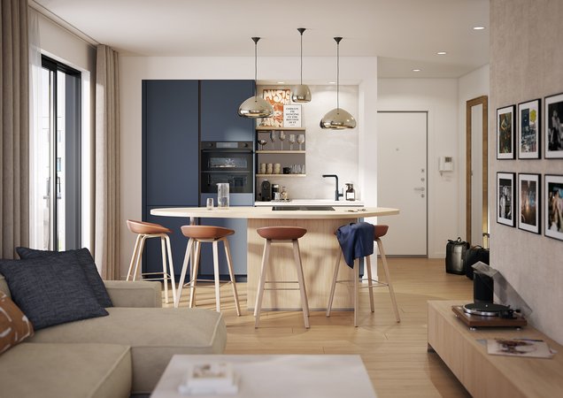 Cuisine avec ilôt bar, bleue et bois, ouverte sur l’espace de vie. 