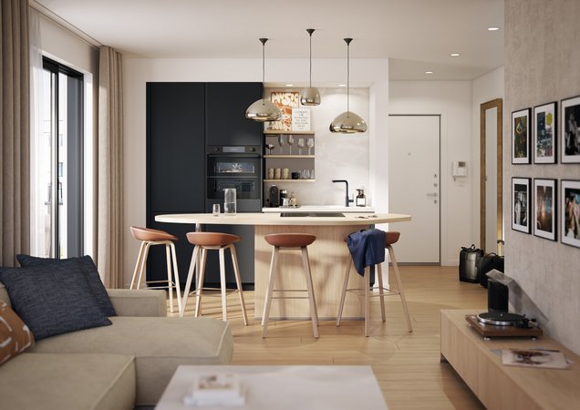 cuisine ouverte et élégante intégrant un îlot central en bois clair et des façades noires mates, baignée par la lumière naturelle et des suspensions dorées.