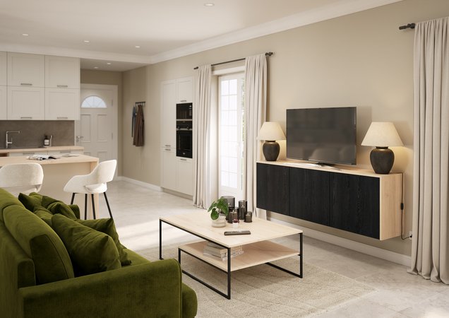 Salon  moderne avec canapé en velours vert, meuble TV suspendu noir et bois, et cuisine ouverte blanche avec îlot et façades de colonnes en bois clair.